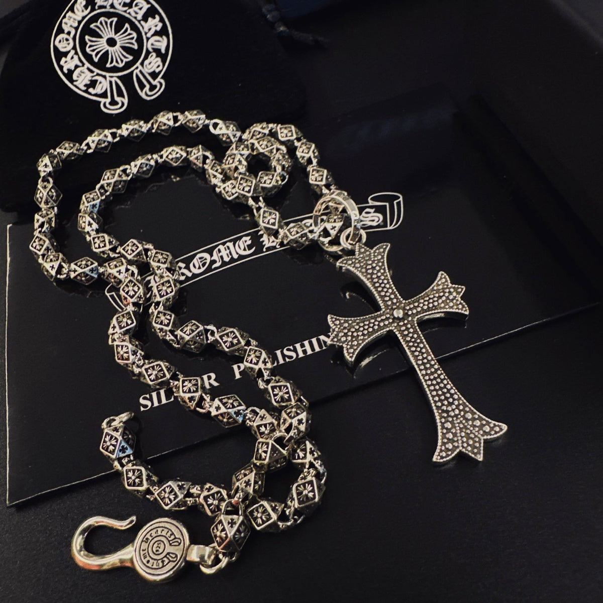 Martin Graham pendant necklace in polished metal-tone – close-up detail