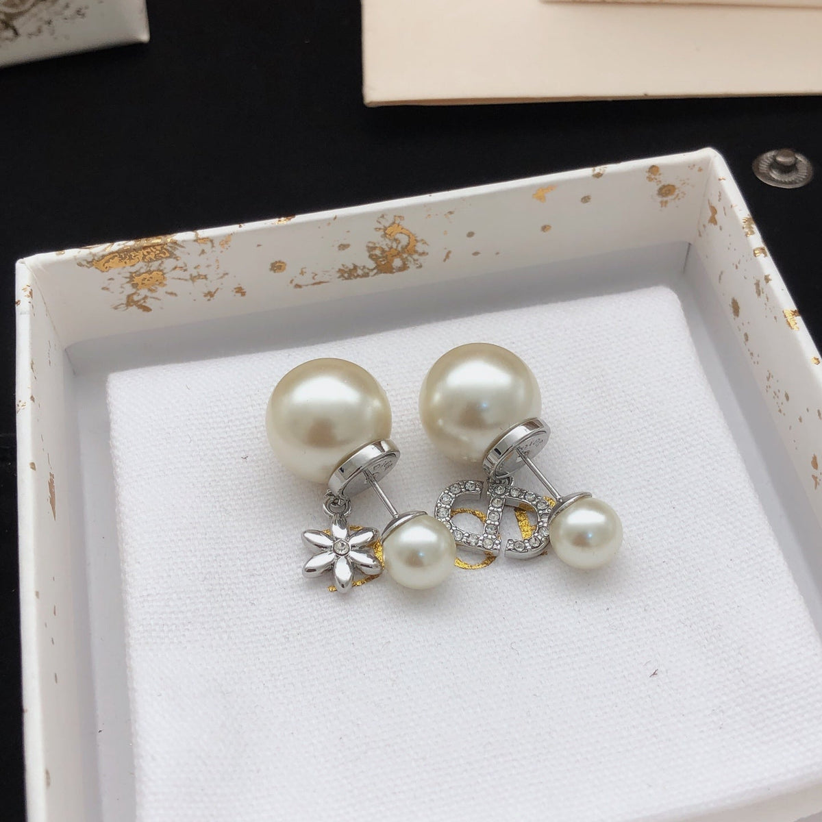 Martin Graham stud earrings in polished metal-tone