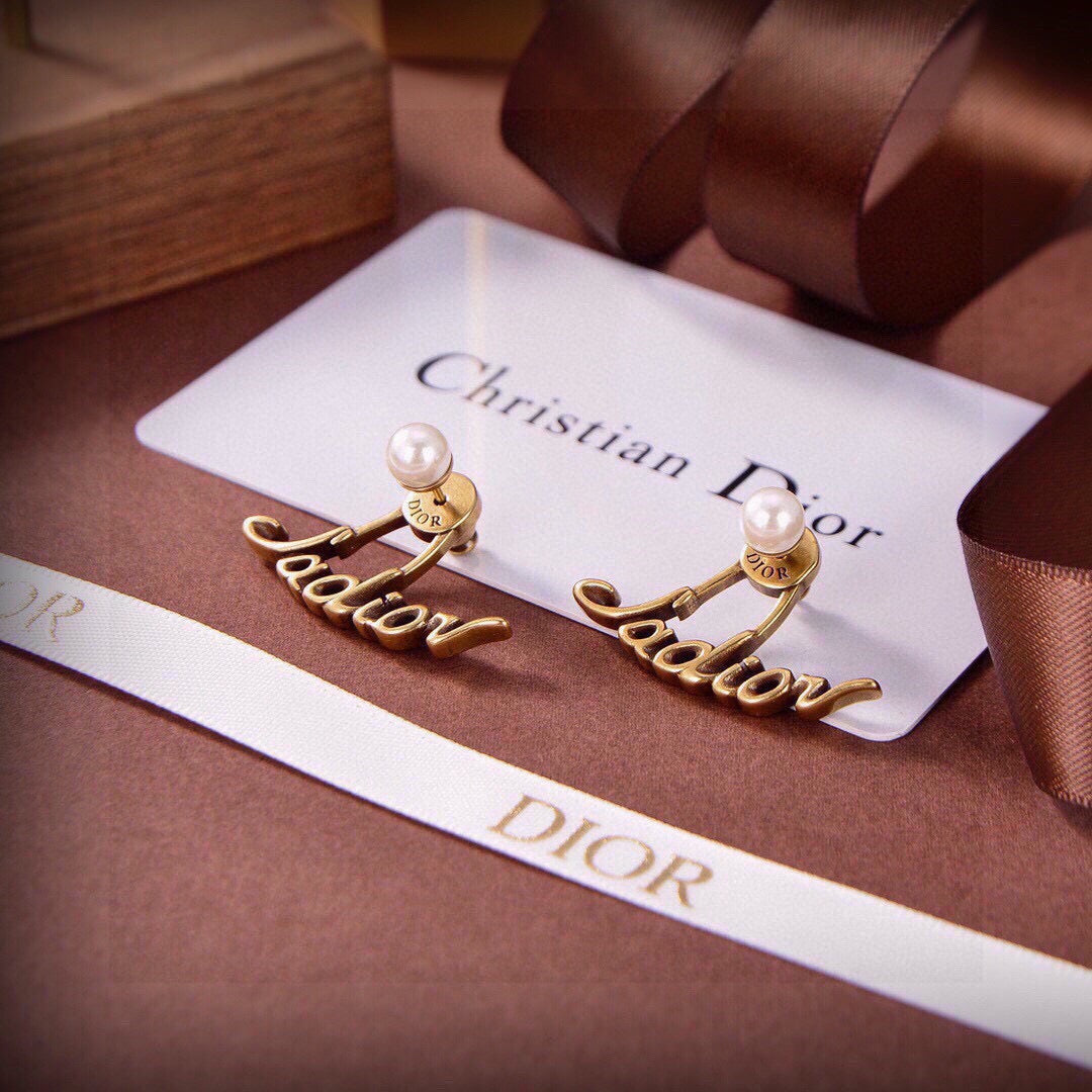 Martin Graham stud earrings in polished metal-tone