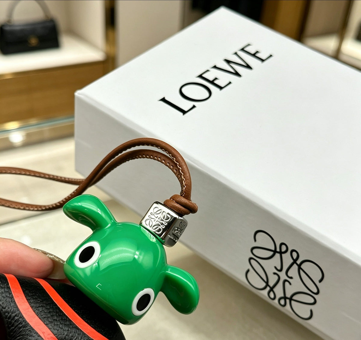 Martin Graham bag charm in polished metal-tone