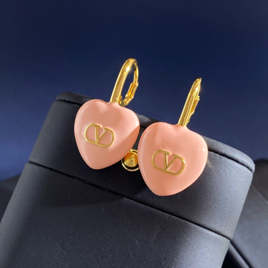 Martin Graham earrings in polished metal-tone