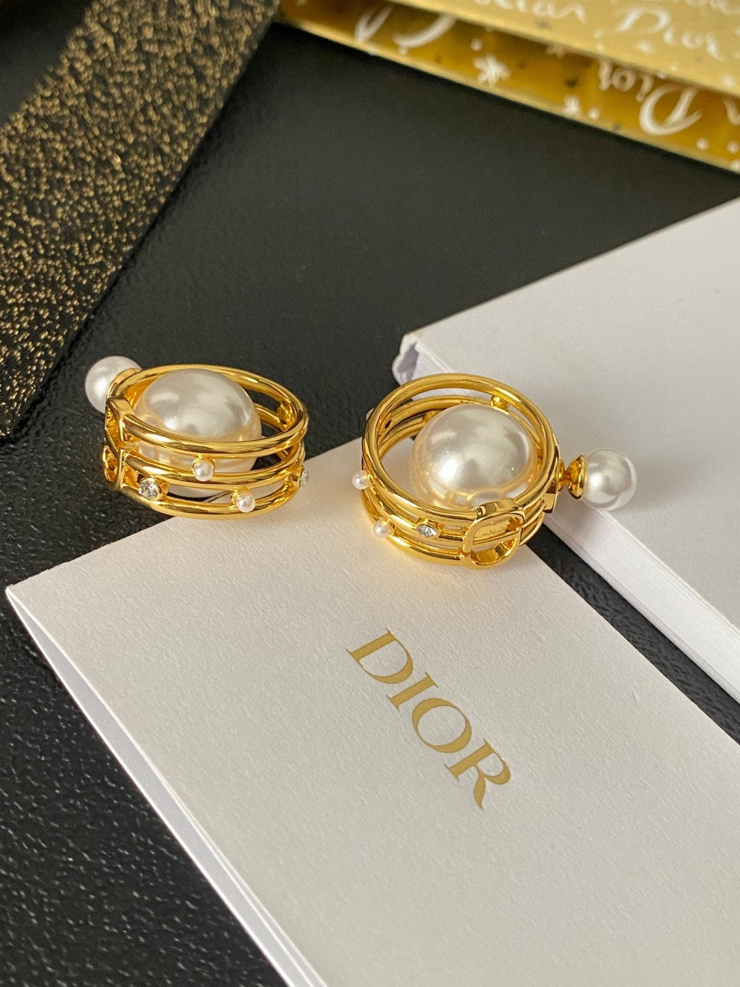 Martin Graham earrings in polished metal-tone