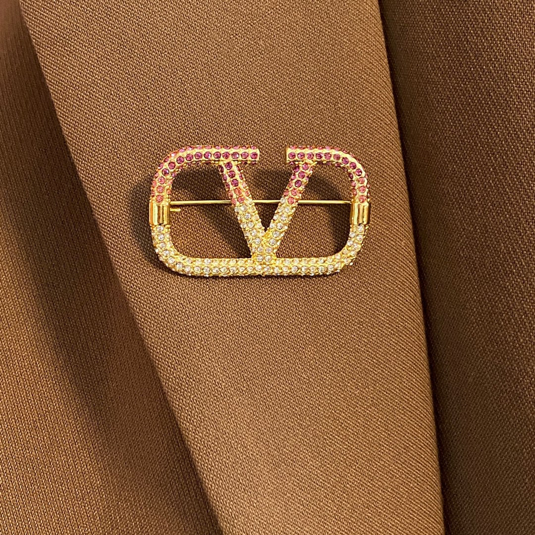 Martin Graham brooch in polished metal-tone