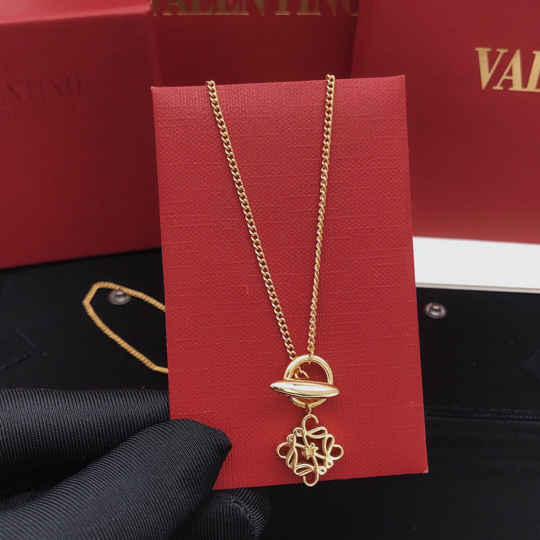 Martin Graham pendant necklace in polished metal-tone