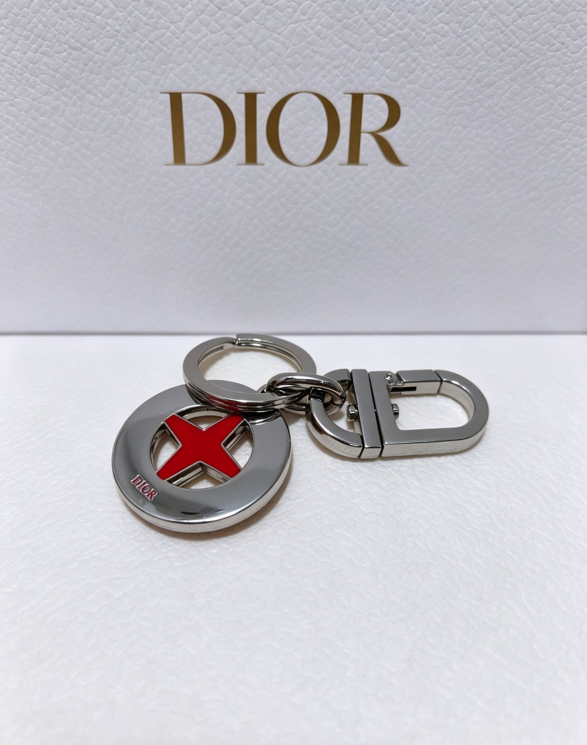 Martin Graham bag charm in polished metal-tone