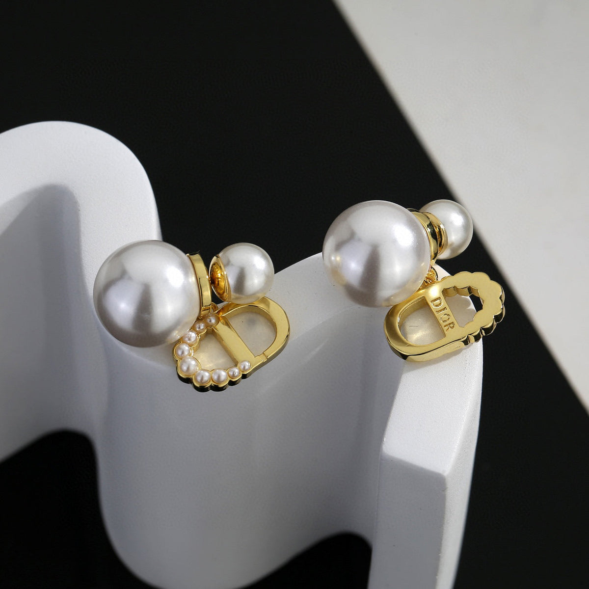 Martin Graham stud earrings in polished metal-tone