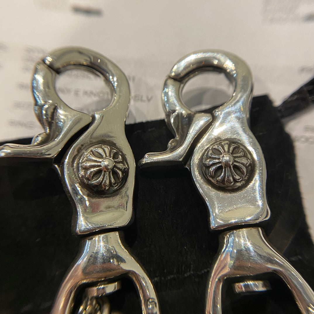 Martin Graham chain accessory in polished metal-tone – close-up detail