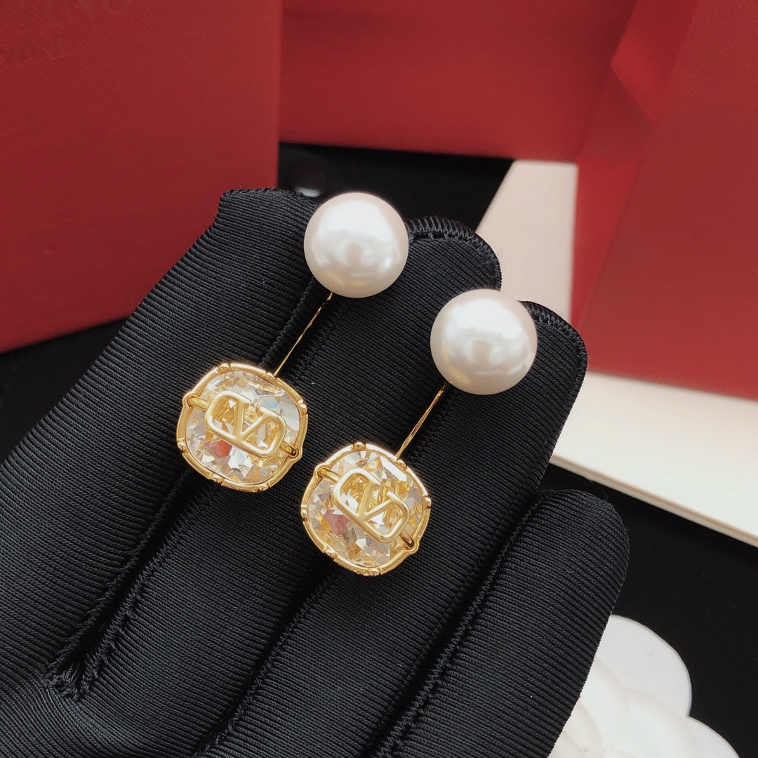 Martin Graham drop earrings in polished metal-tone