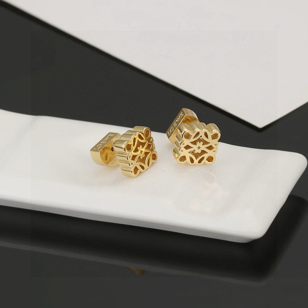 Martin Graham stud earrings in polished metal-tone