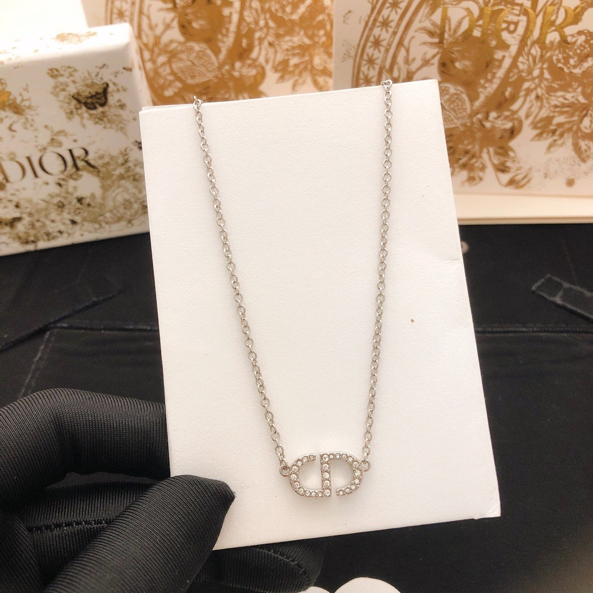 Martin Graham pendant necklace in polished metal-tone