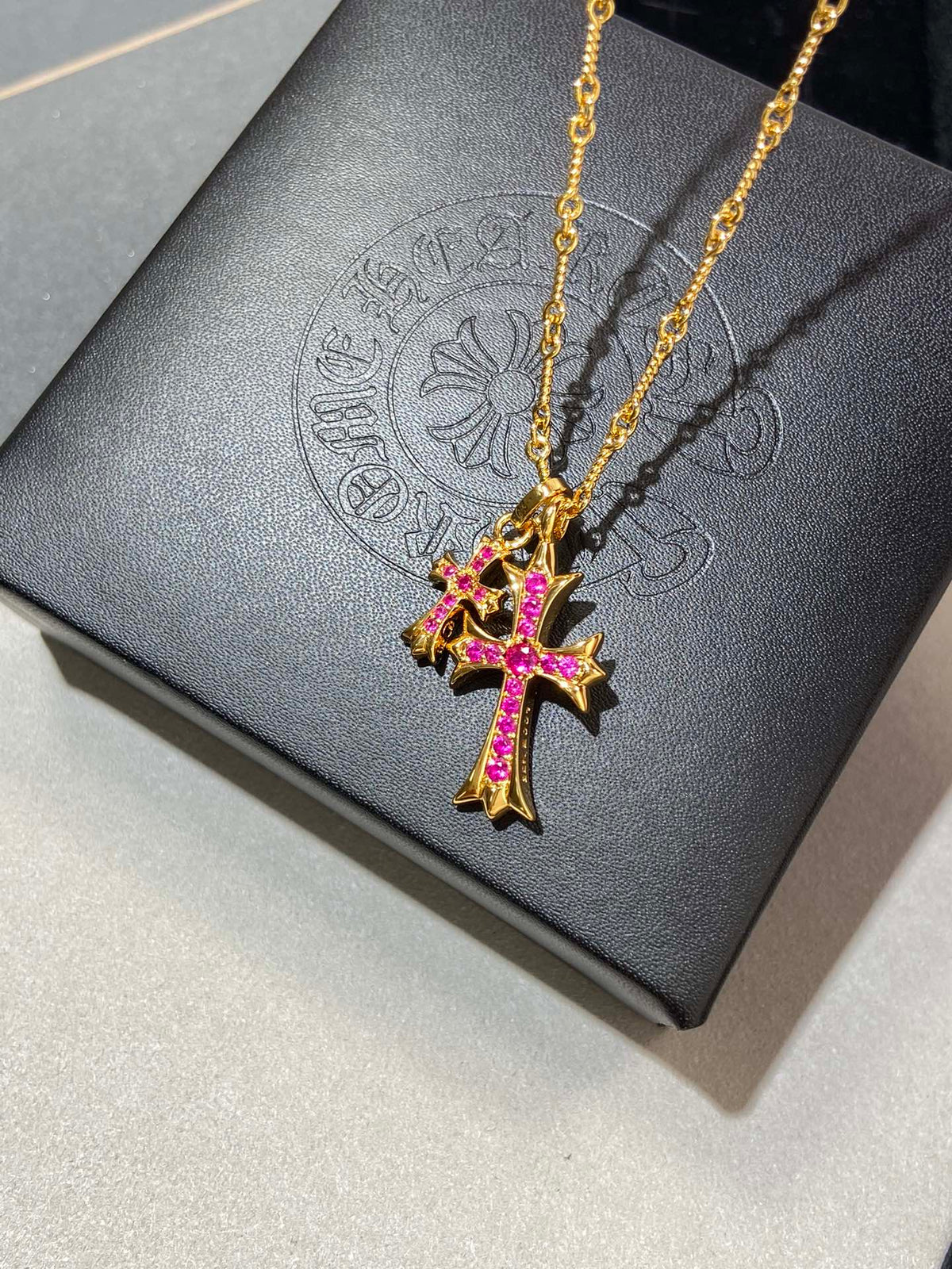 Martin Graham pendant necklace in polished metal-tone – close-up detail