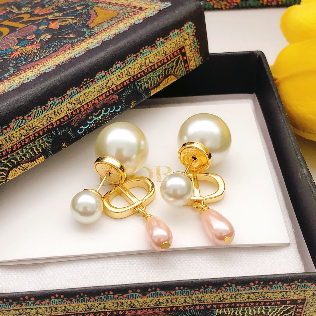 Martin Graham stud earrings in polished metal-tone