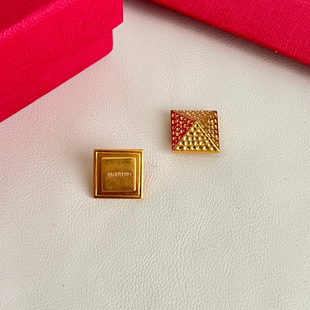 Martin Graham earrings in polished metal-tone
