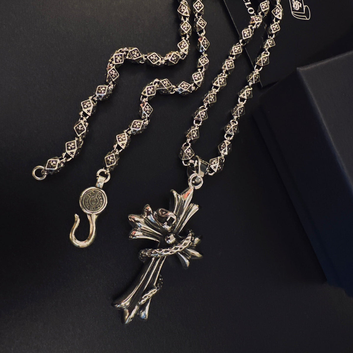 Martin Graham pendant necklace in polished metal-tone – close-up detail