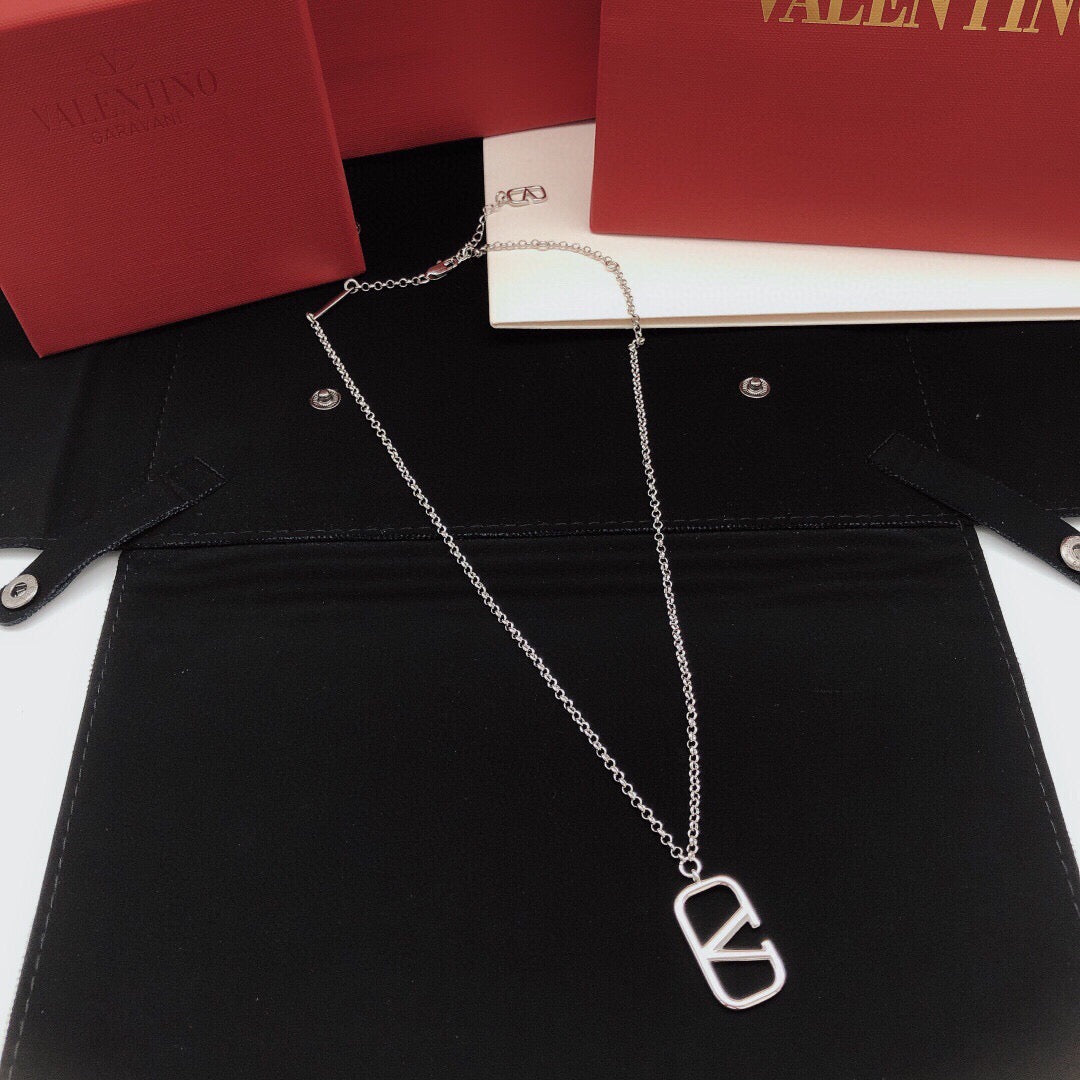 Martin Graham pendant necklace in polished metal-tone