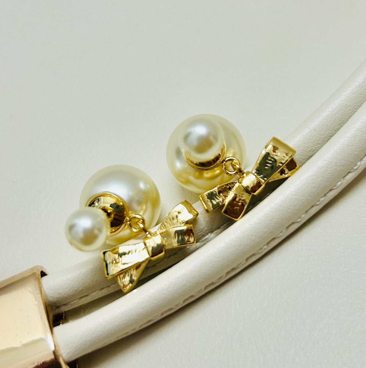 Martin Graham stud earrings in polished metal-tone