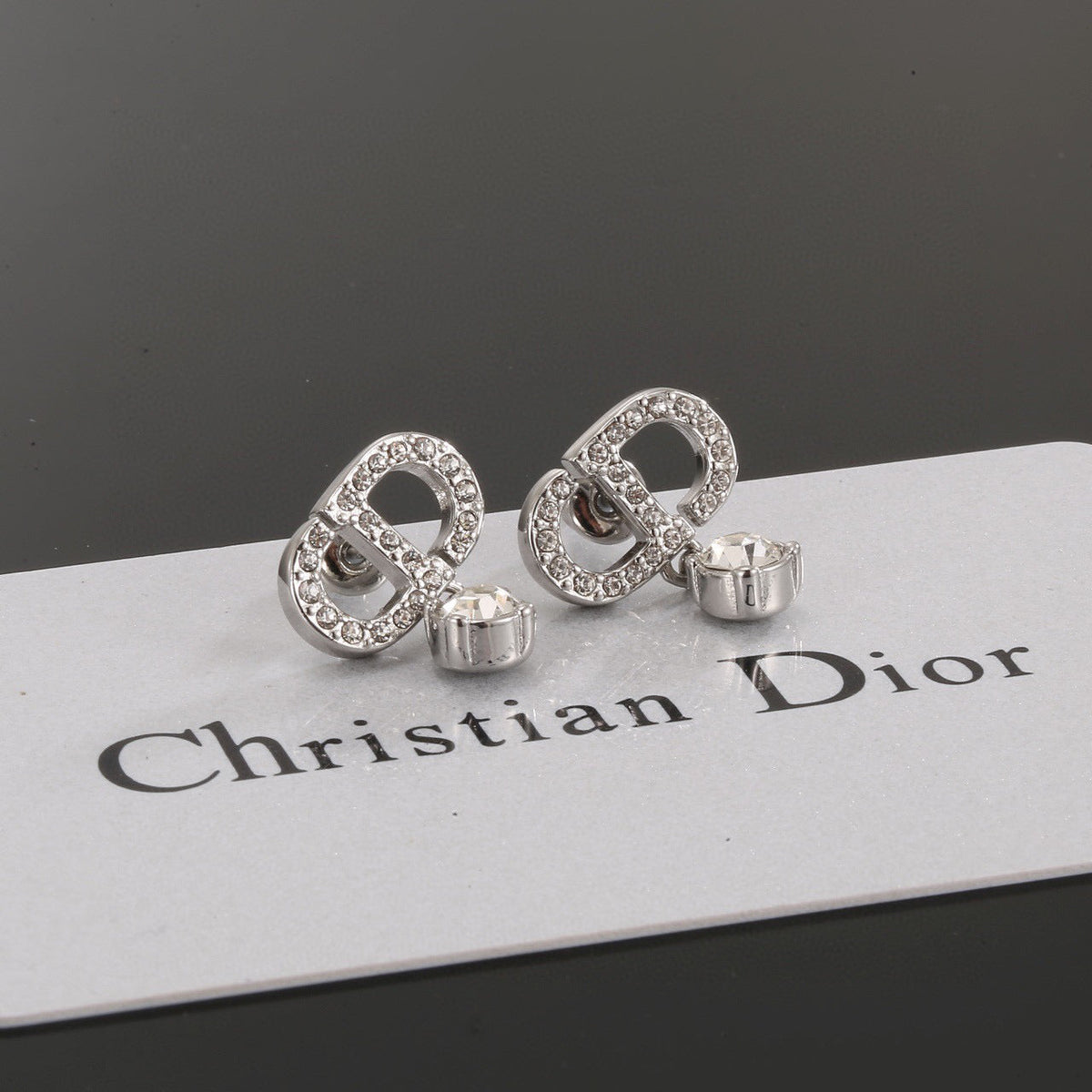 Martin Graham stud earrings in polished metal-tone