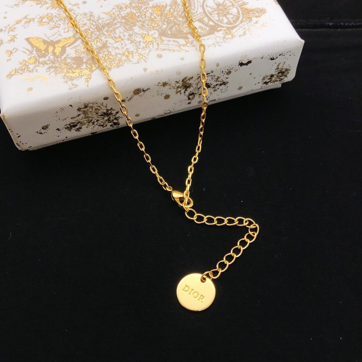 Martin Graham pendant necklace in polished metal-tone