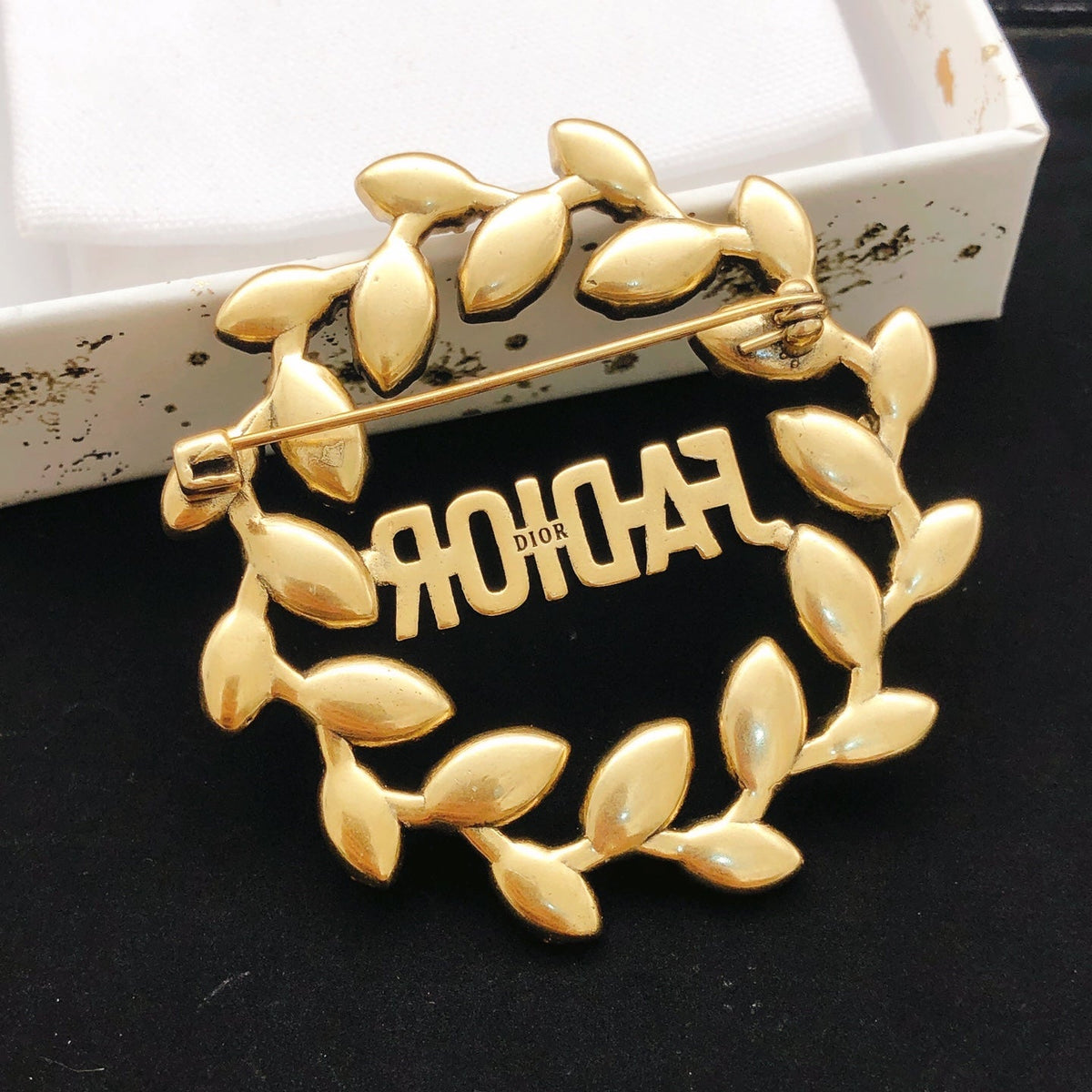 Martin Graham brooch in polished metal-tone