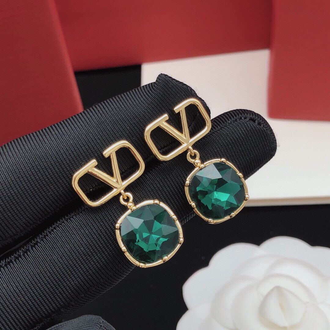 Martin Graham stud earrings in polished metal-tone