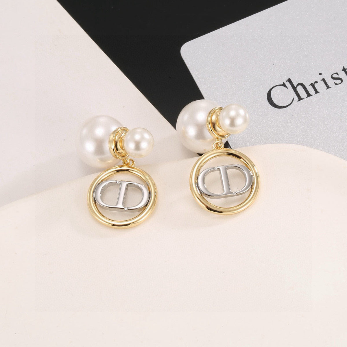 Martin Graham stud earrings in polished metal-tone