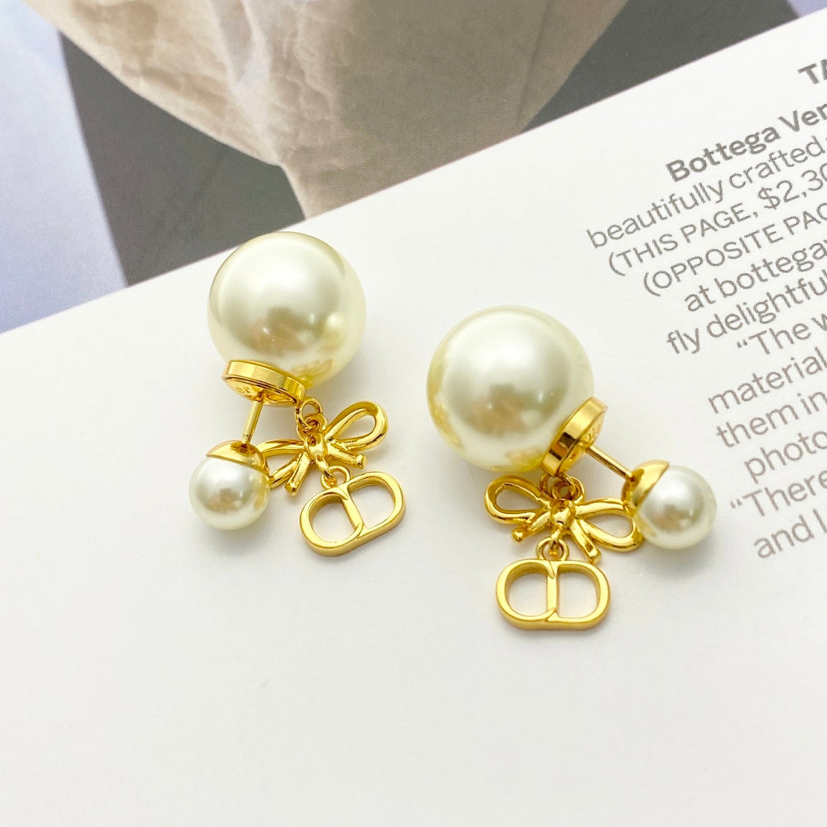 Martin Graham stud earrings in polished metal-tone
