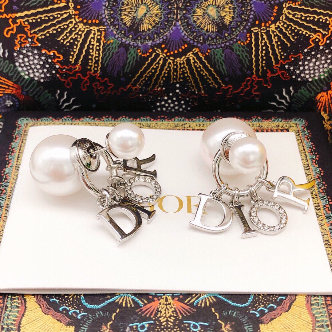 Martin Graham earrings in polished metal-tone