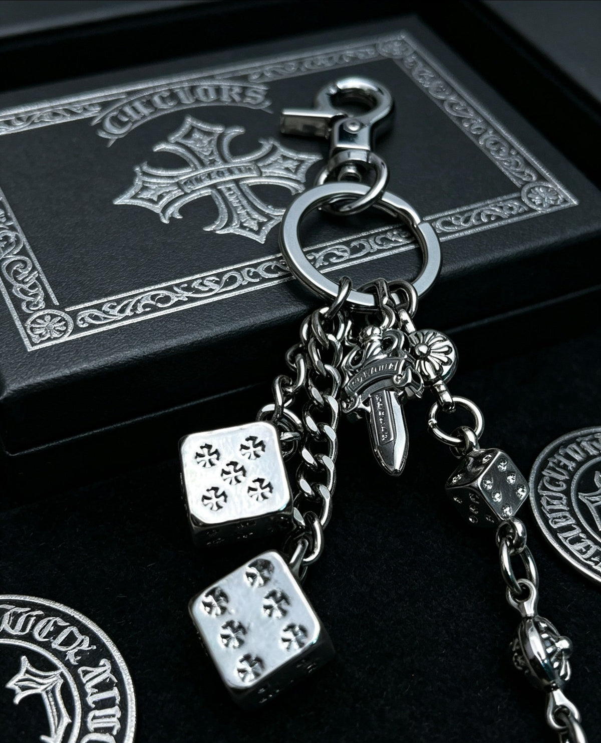 Martin Graham chain accessory in polished metal-tone – close-up detail