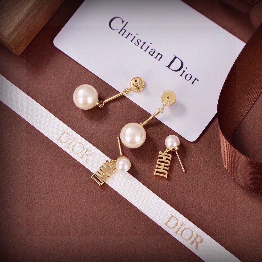 Martin Graham earrings in polished metal-tone