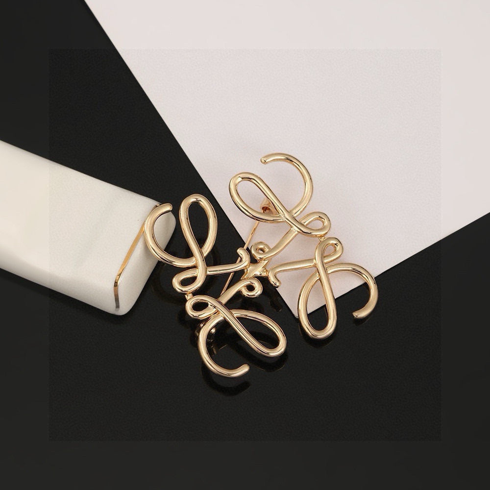 Martin Graham brooch in polished metal-tone