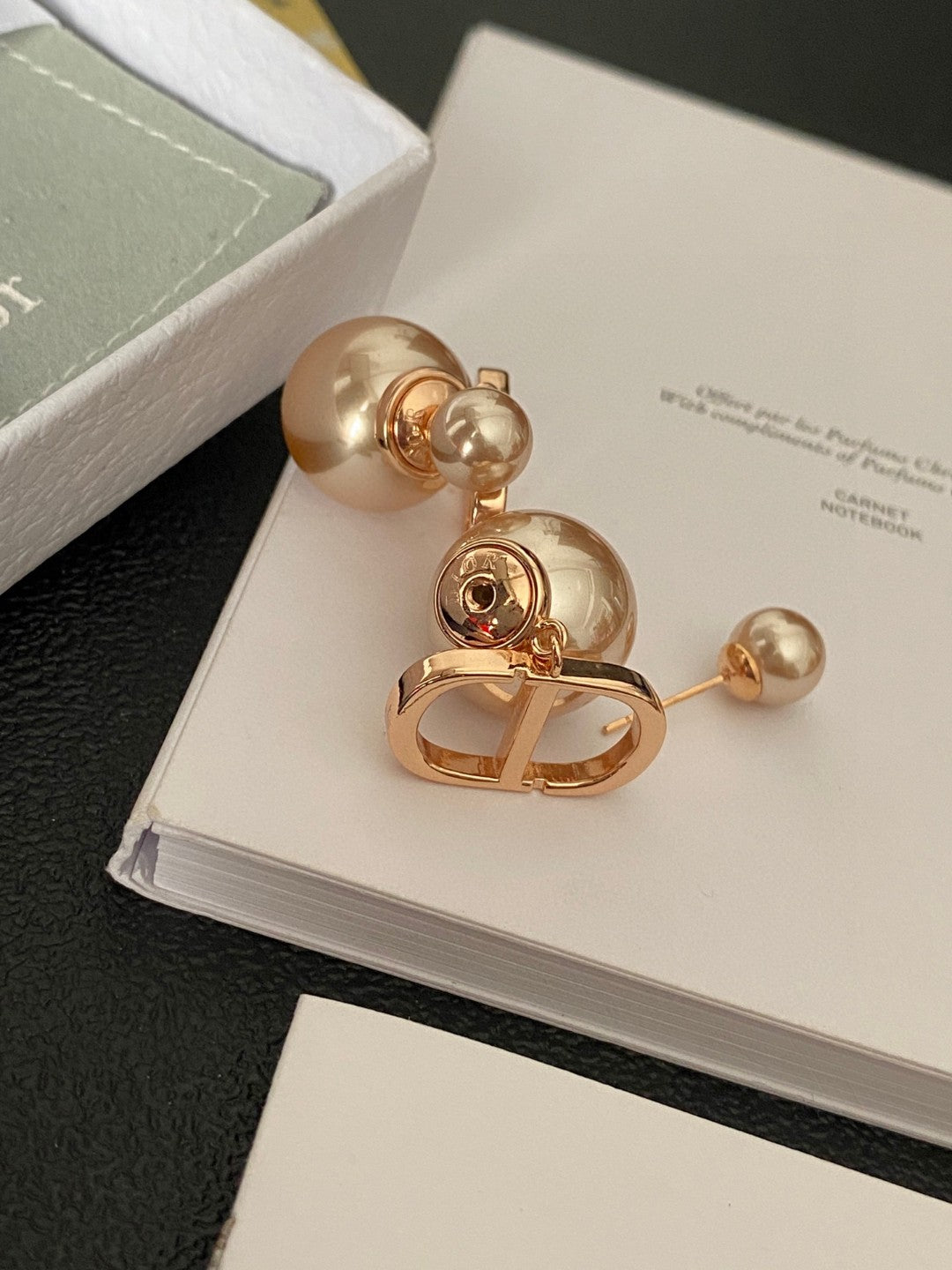 Martin Graham earrings in polished metal-tone – close-up detail