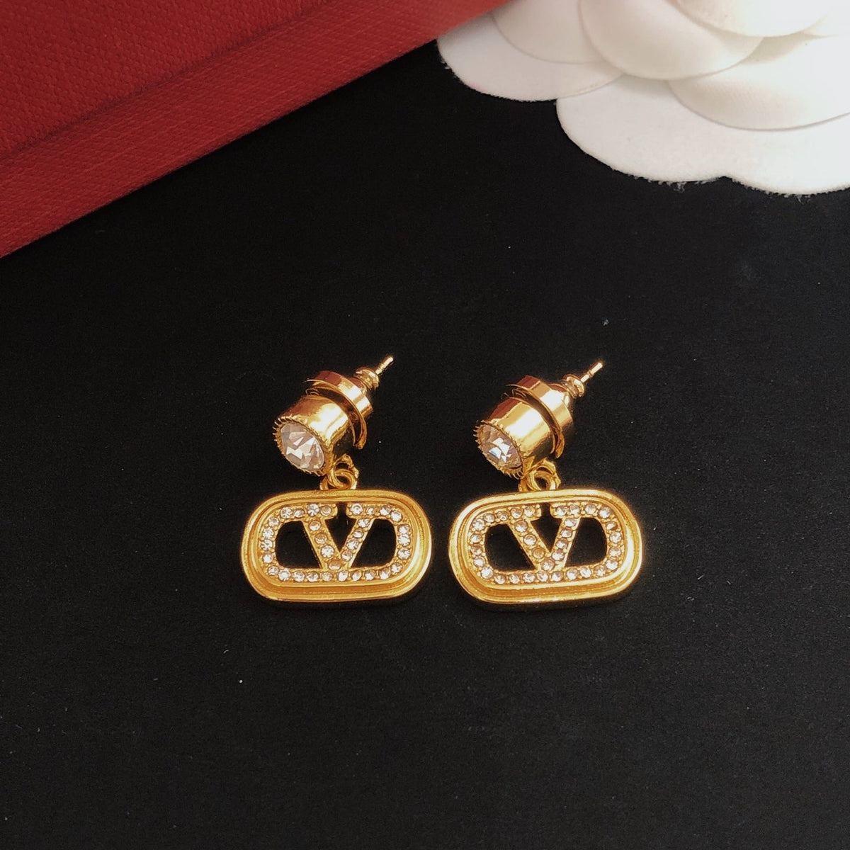 Martin Graham stud earrings in polished metal-tone