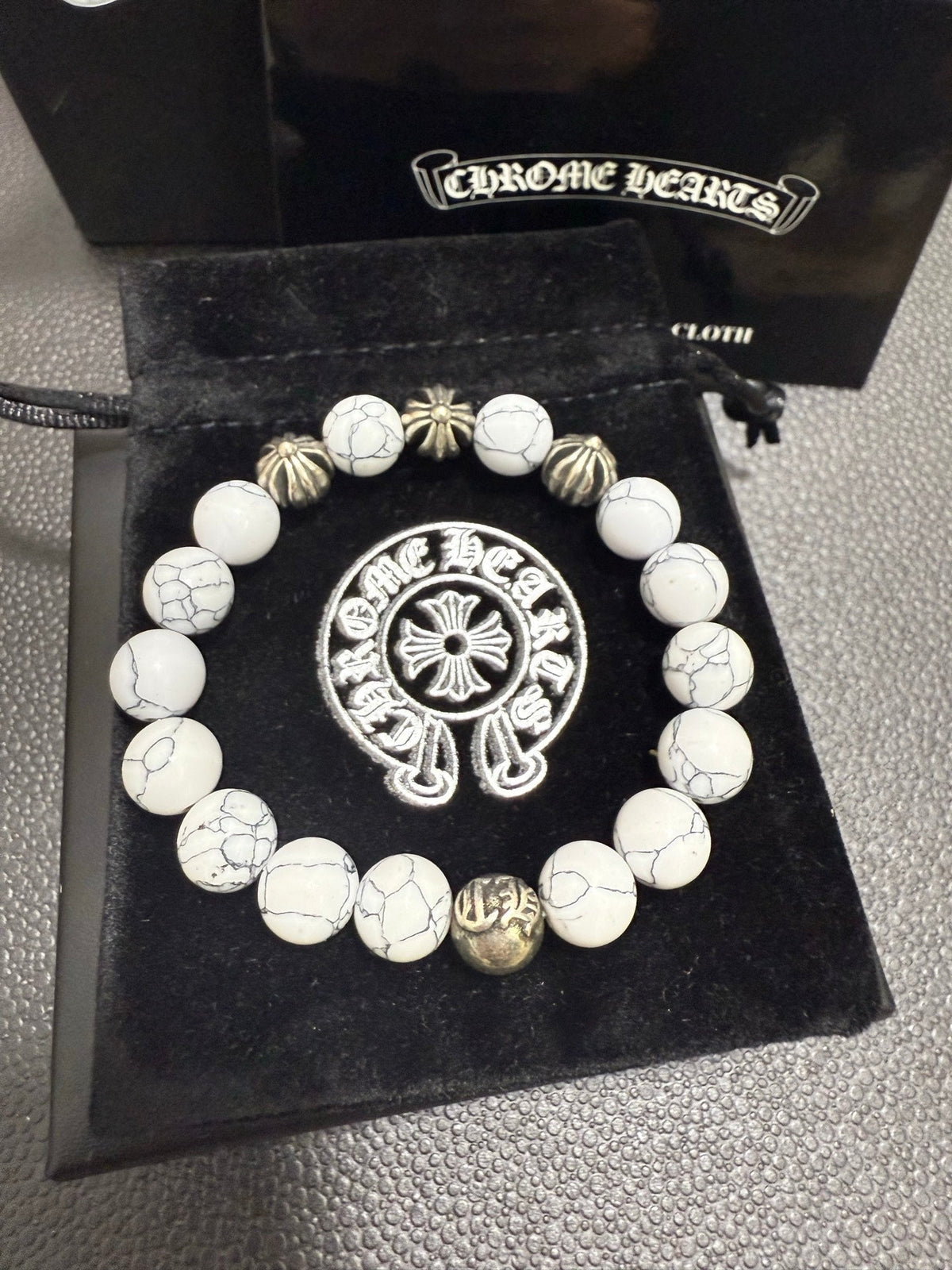 Martin Graham jewelry accessory in polished metal-tone – styled product view