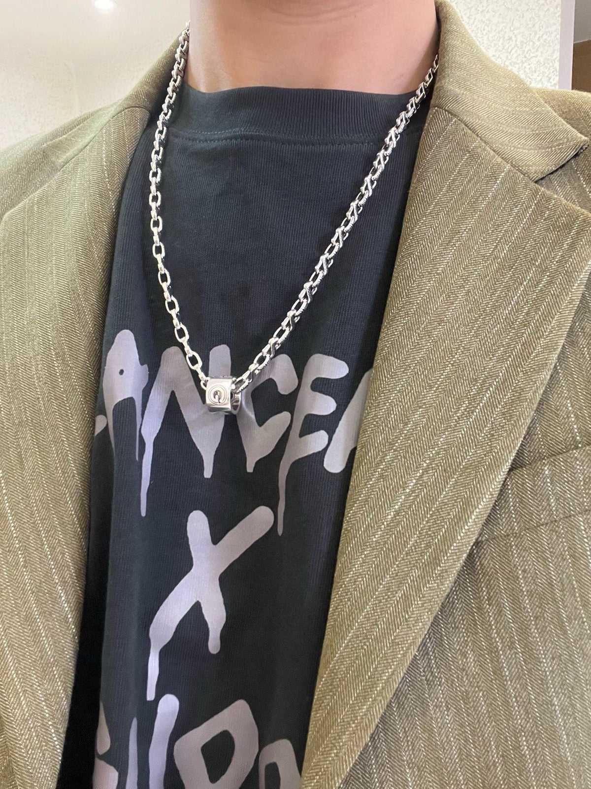 Martin Graham pendant necklace in polished metal-tone – styled product view