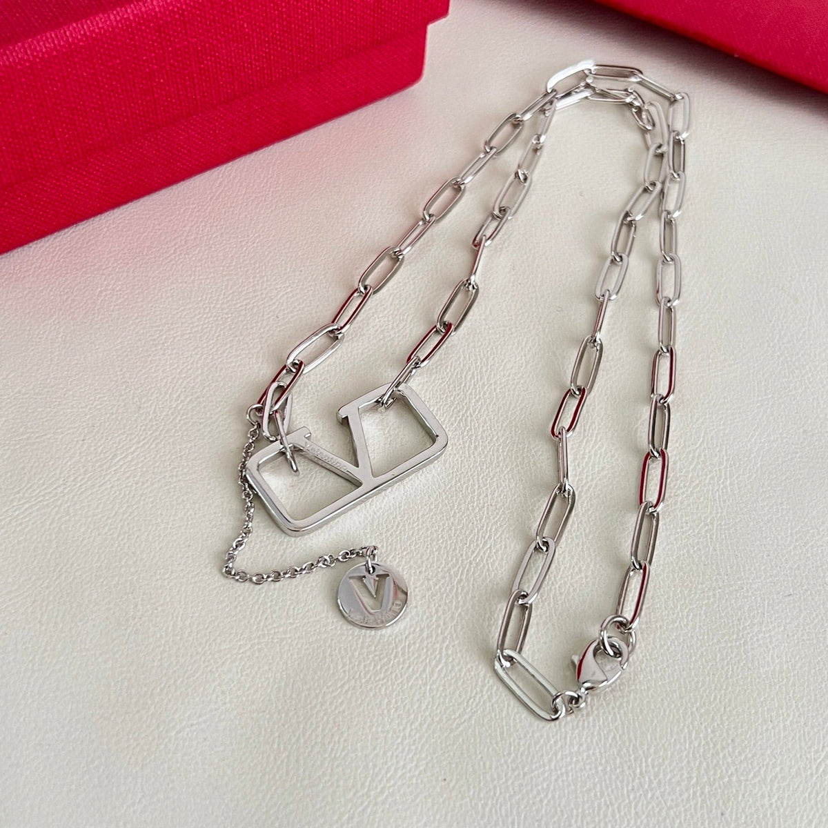 Martin Graham pendant necklace in polished metal-tone