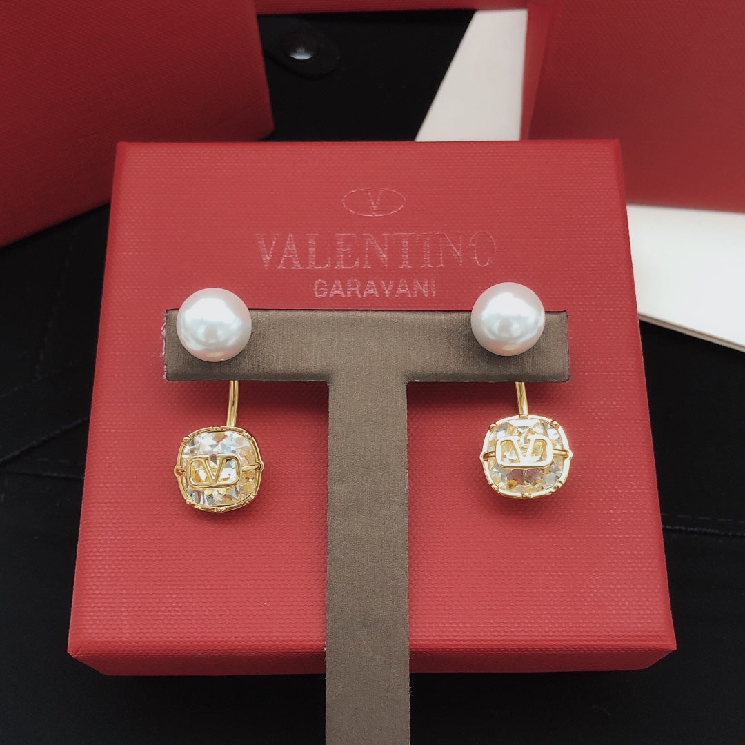 Martin Graham drop earrings in polished metal-tone