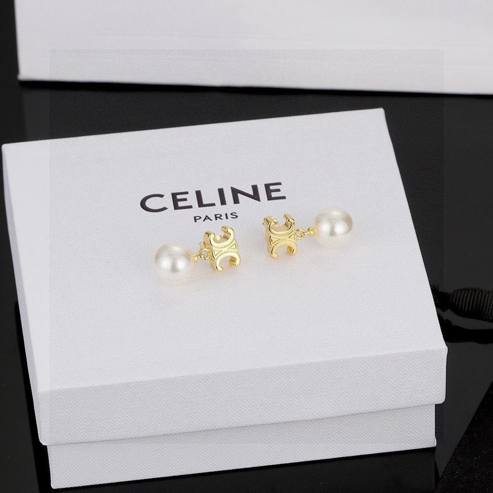 Martin Graham stud earrings in polished metal-tone