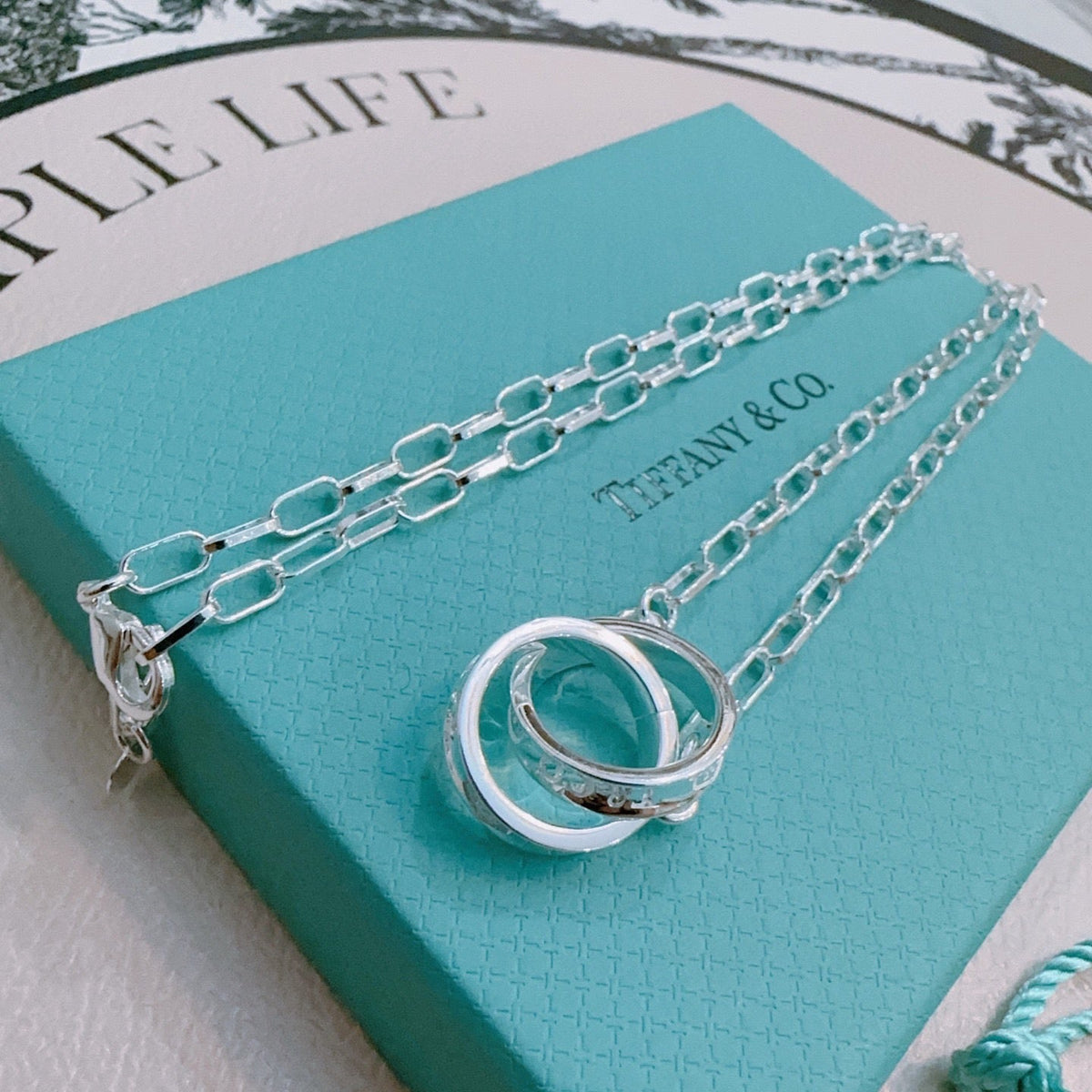 Martin Graham pendant necklace in polished metal-tone – styled product view