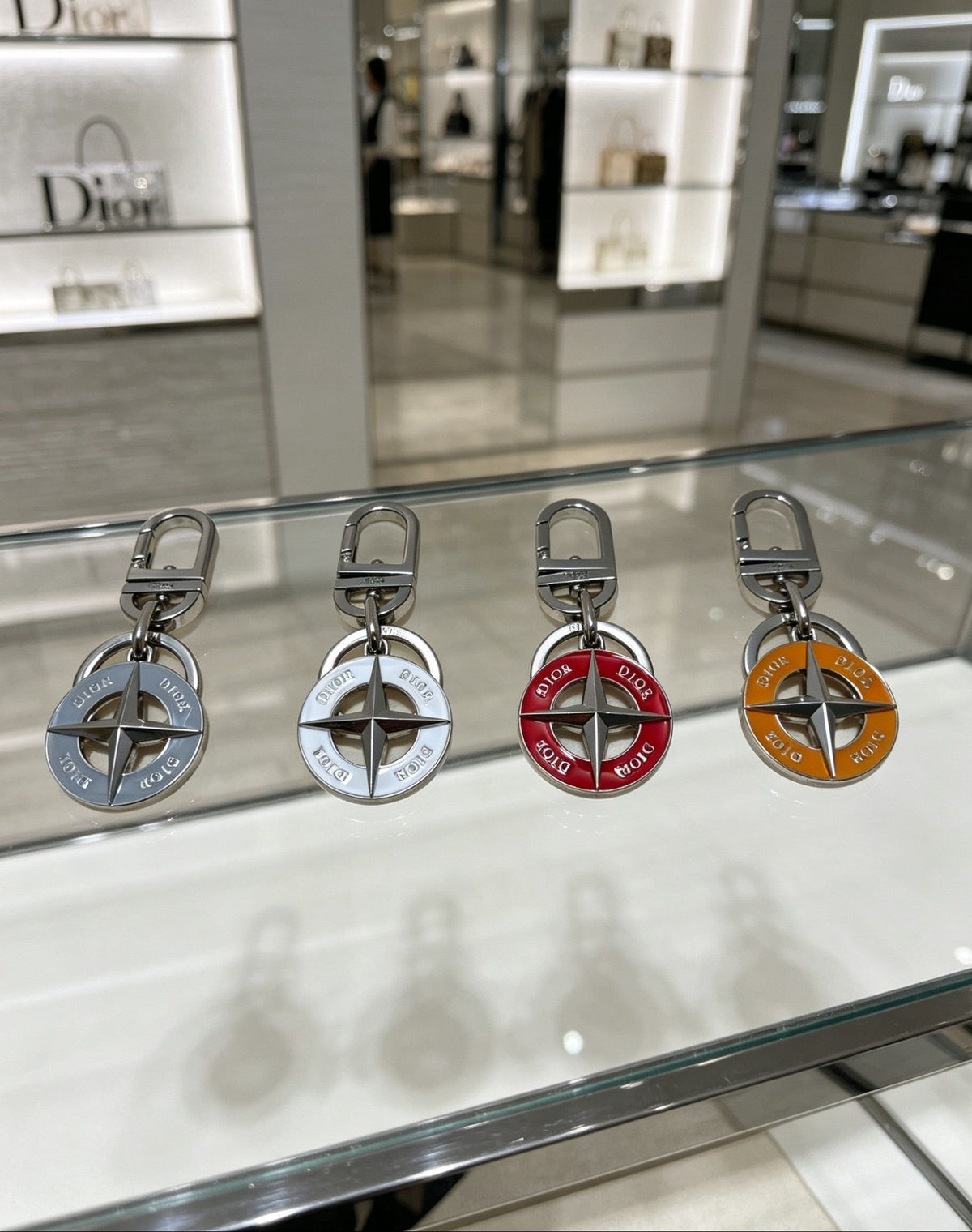 Martin Graham bag charm in polished metal-tone – close-up detail