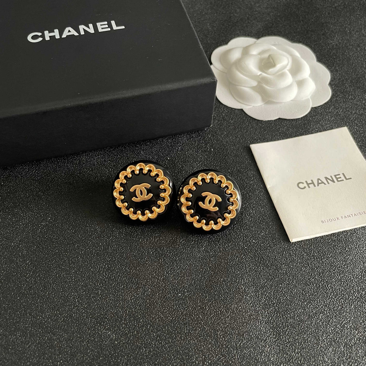 Martin Graham stud earrings in polished metal-tone – styled product view