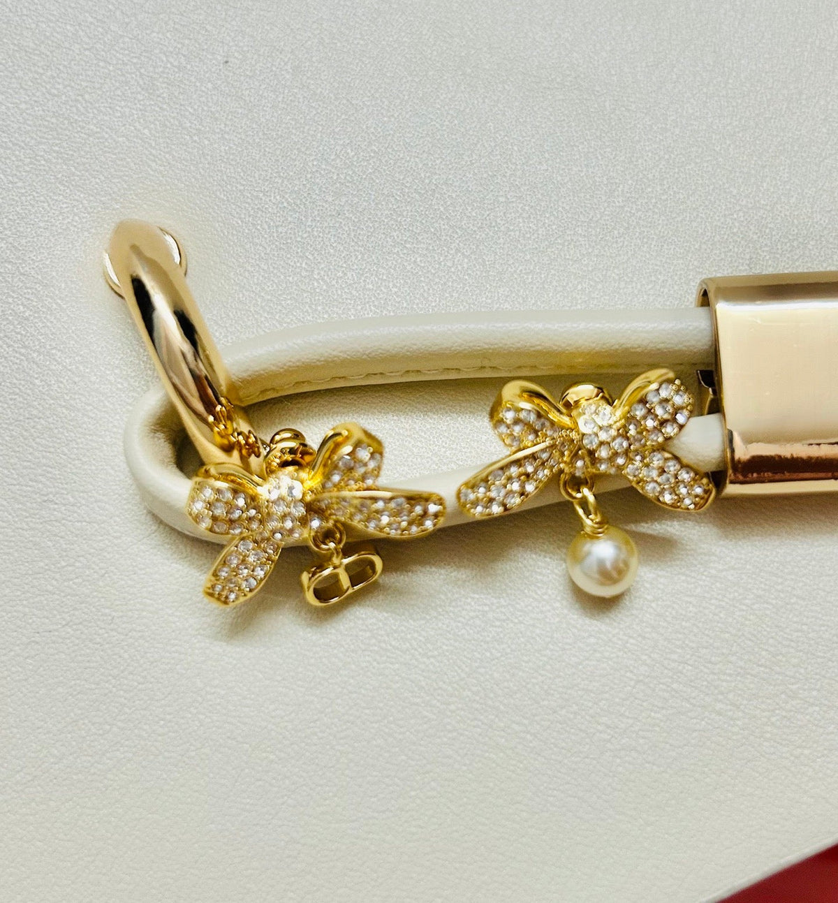 Martin Graham earrings in polished metal-tone – close-up detail