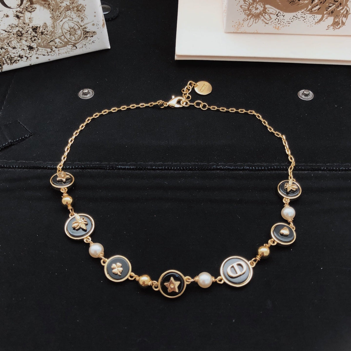 Martin Graham pendant necklace in polished metal-tone – close-up detail