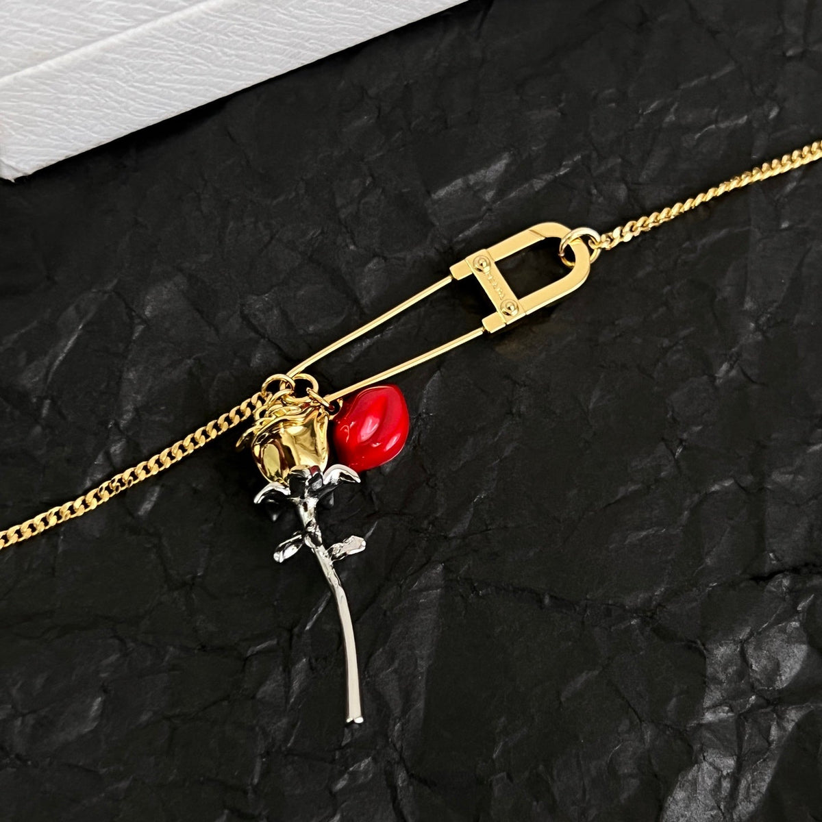 Martin Graham bracelet in polished metal-tone