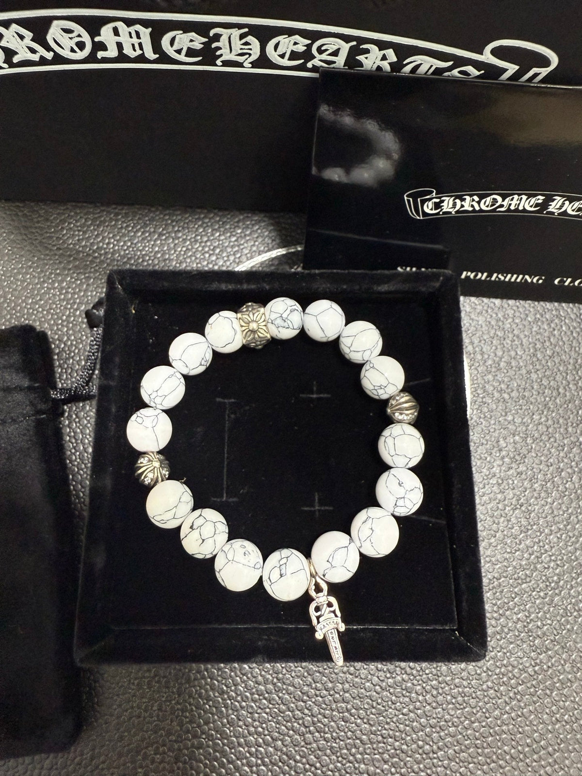 Martin Graham jewelry accessory in polished metal-tone – styled product view