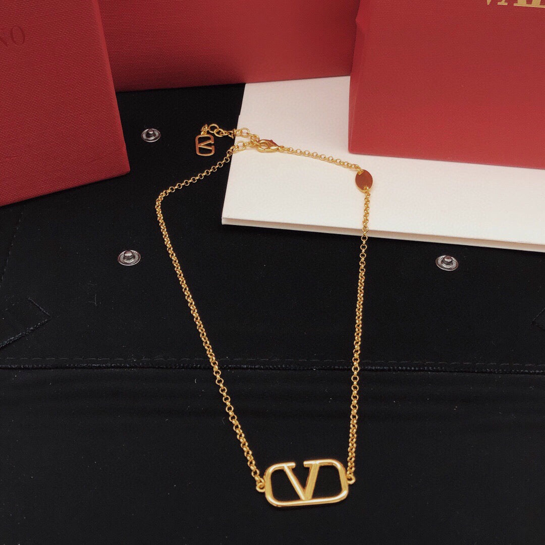 Martin Graham pendant necklace in polished metal-tone