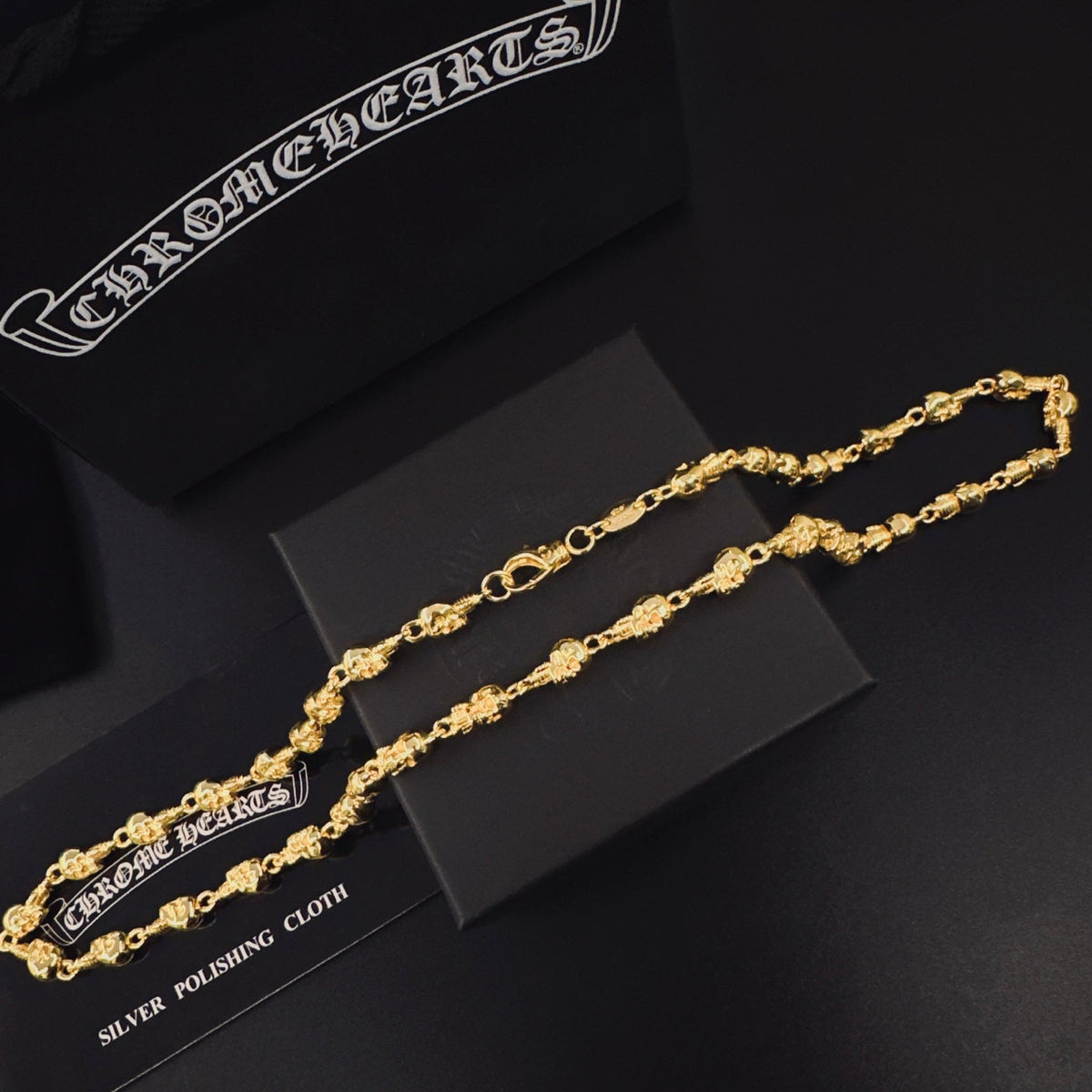 Martin Graham pendant necklace in polished metal-tone – styled product view