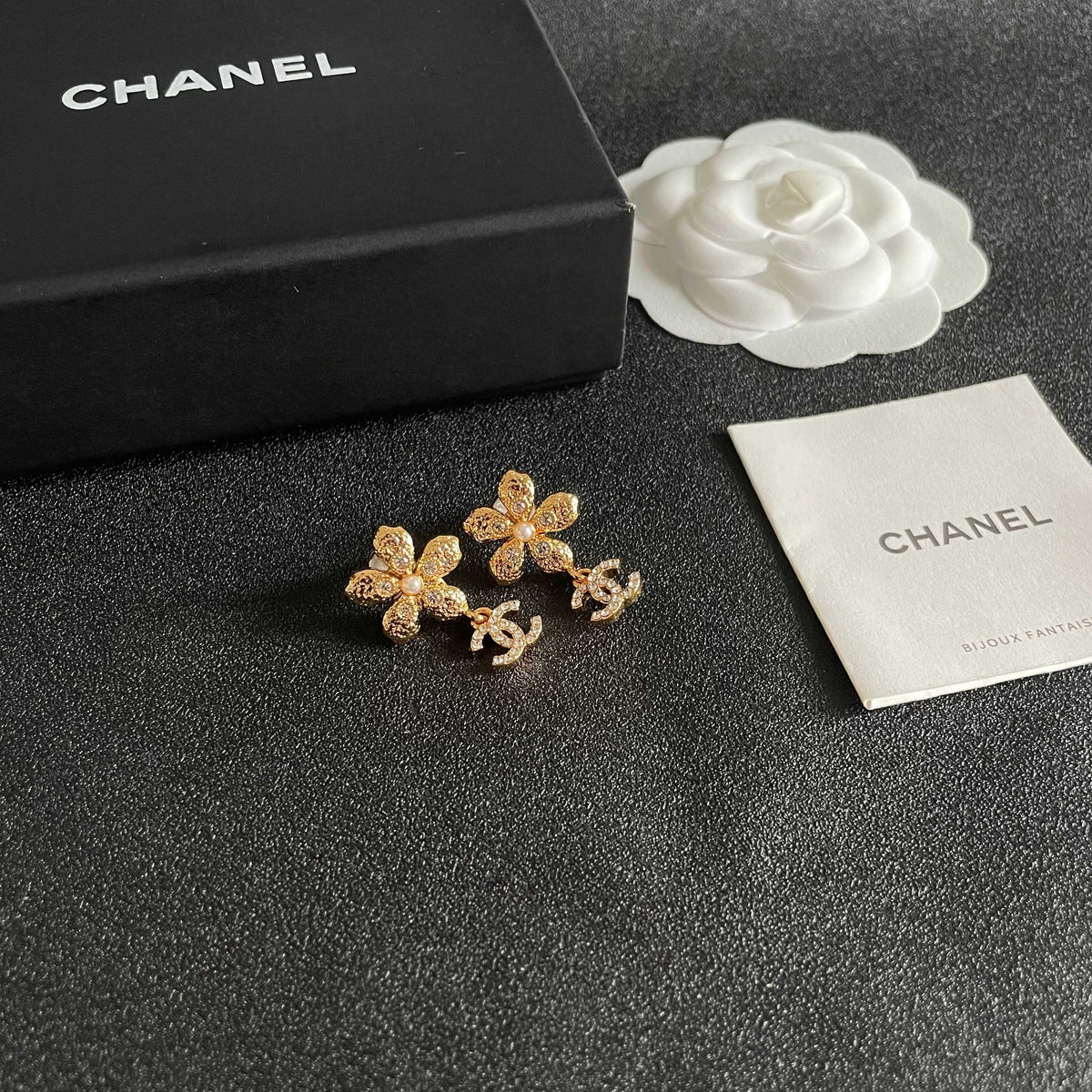 Martin Graham stud earrings in polished metal-tone – styled product view