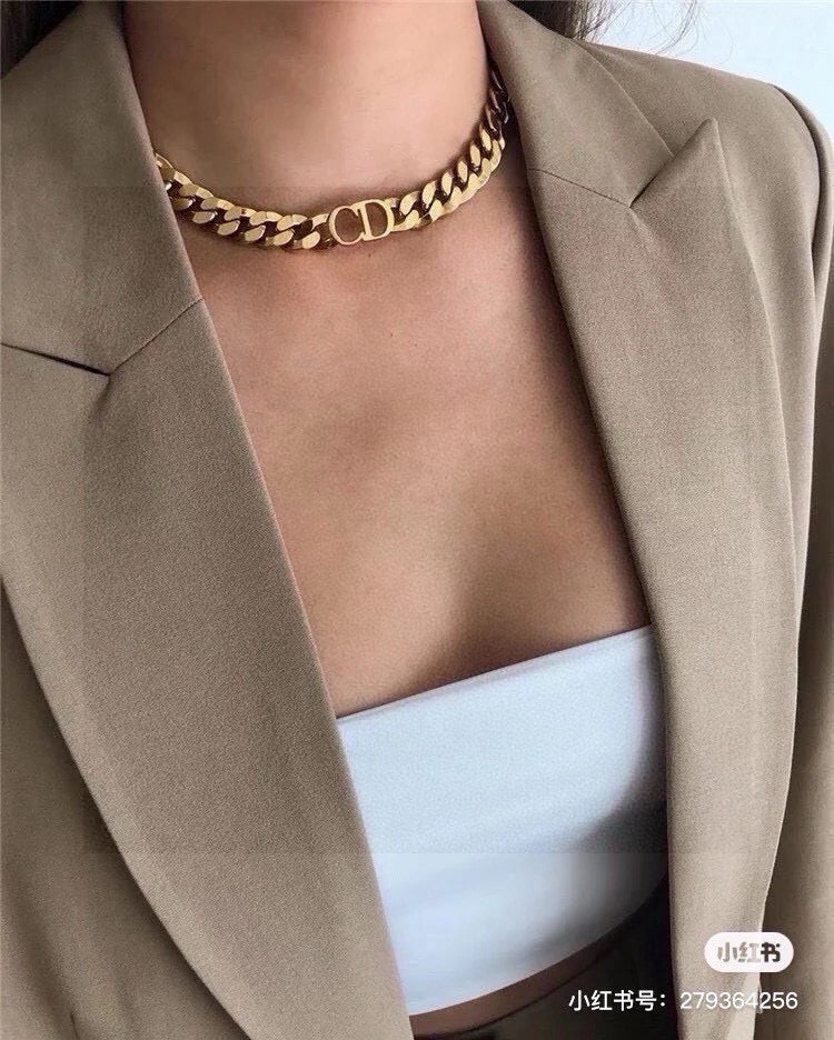 Martin Graham pendant necklace in polished metal-tone – close-up detail