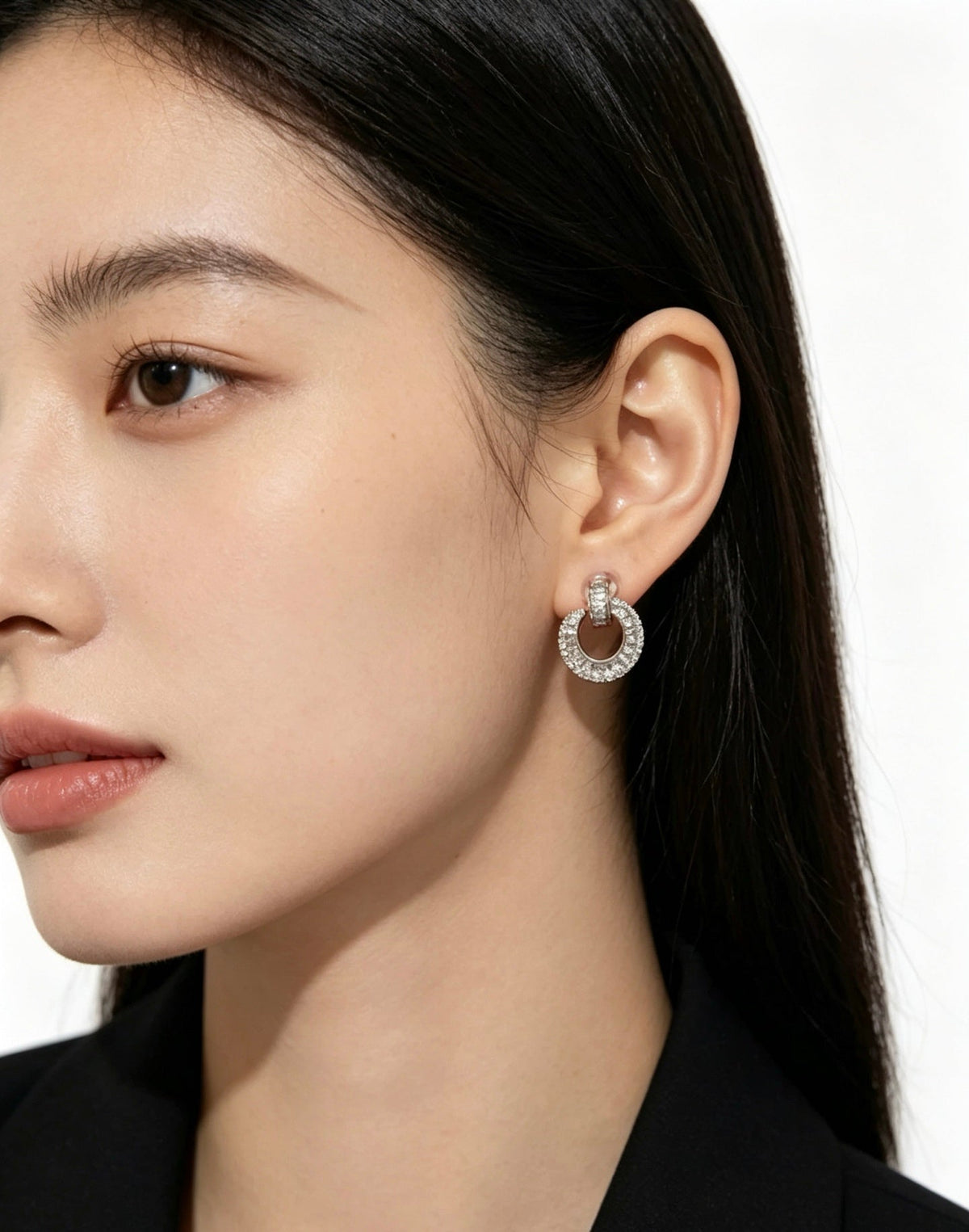 Martin Graham earrings in polished metal-tone – close-up detail