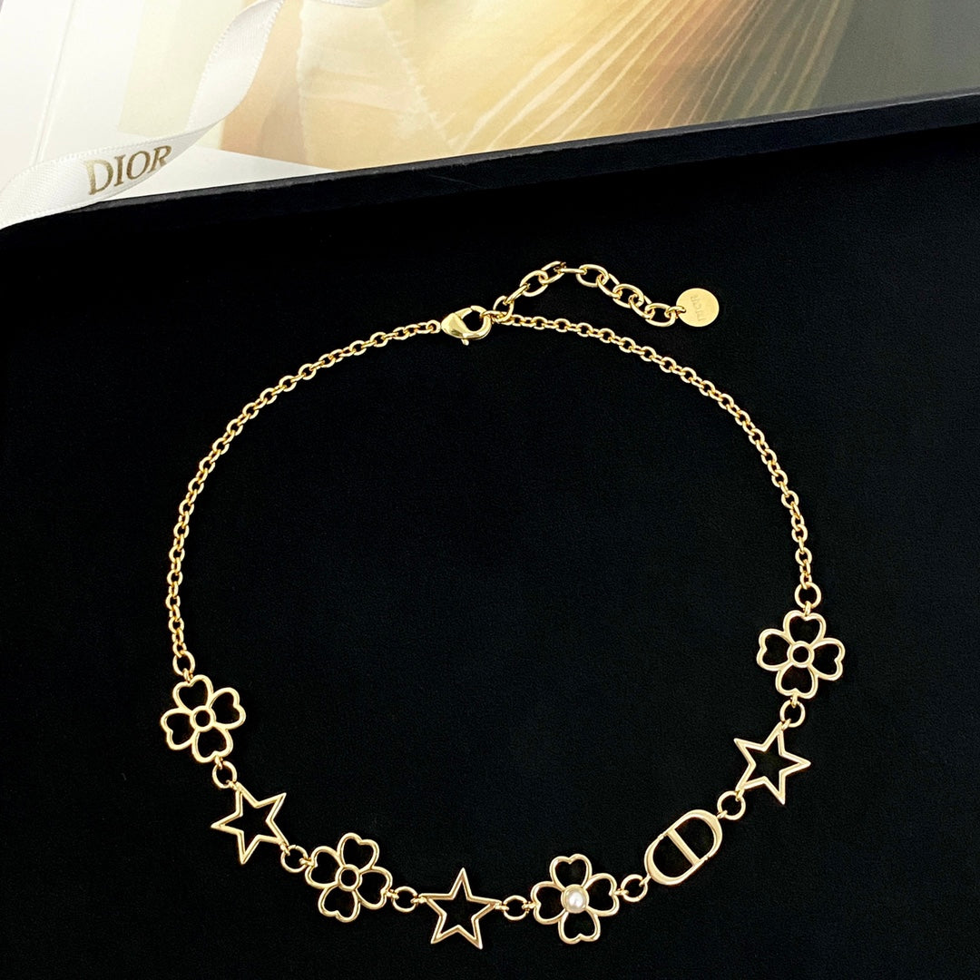 Martin Graham pendant necklace in polished metal-tone – close-up detail